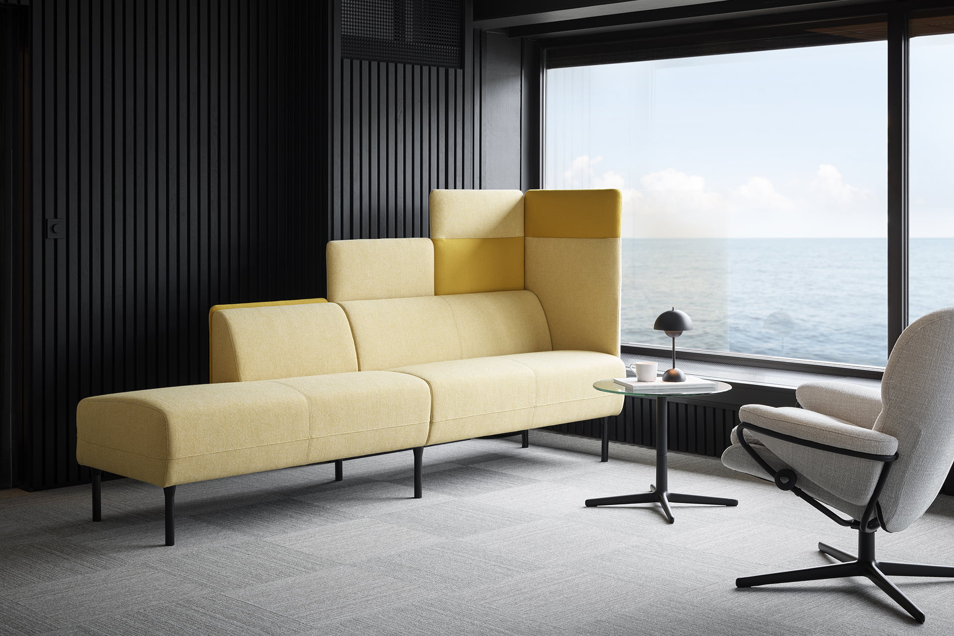 Yellow Frende modular sofa on board a vessel