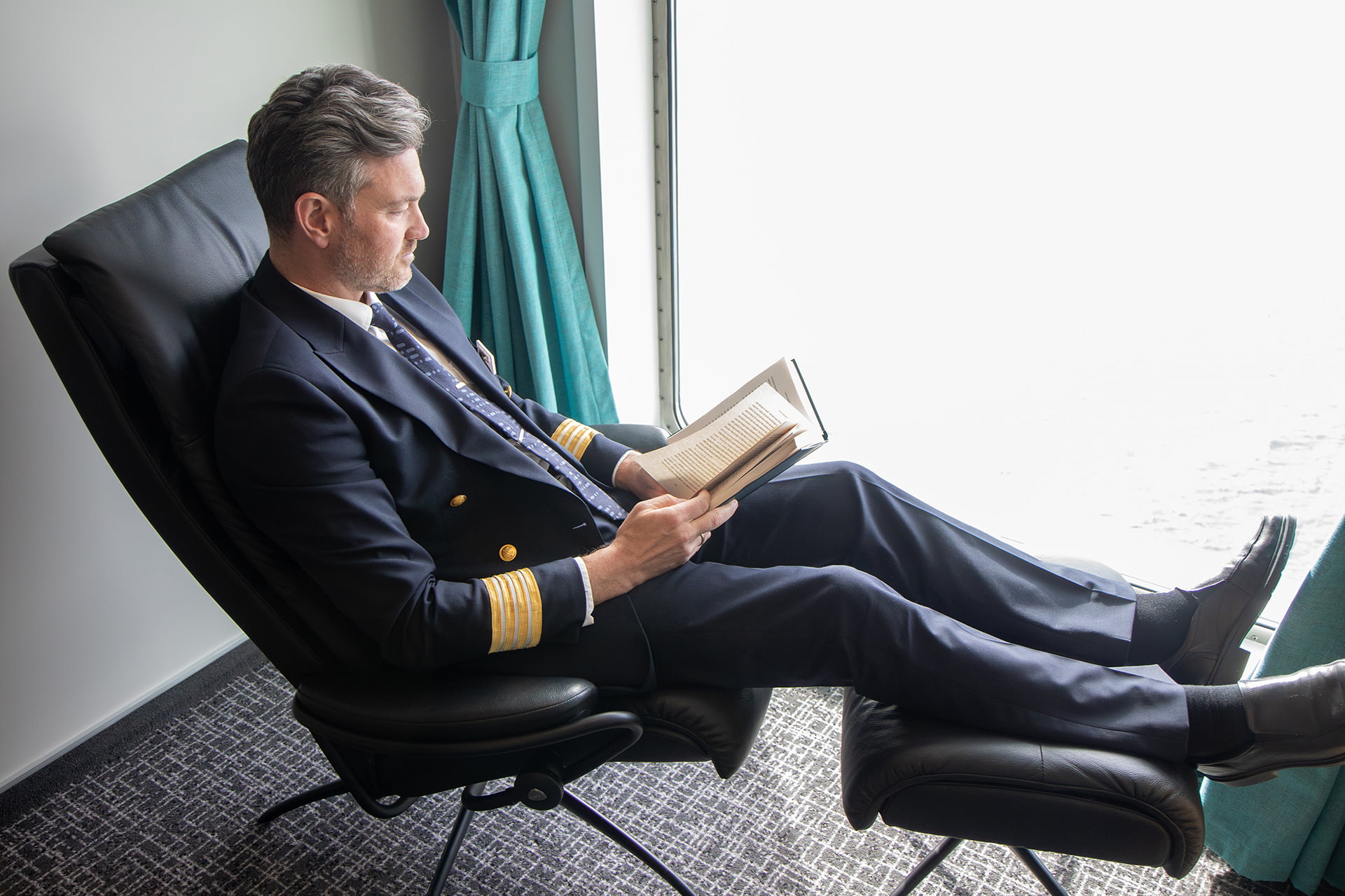 Hotel Manager at Havila Polaris in a Stressless recliner