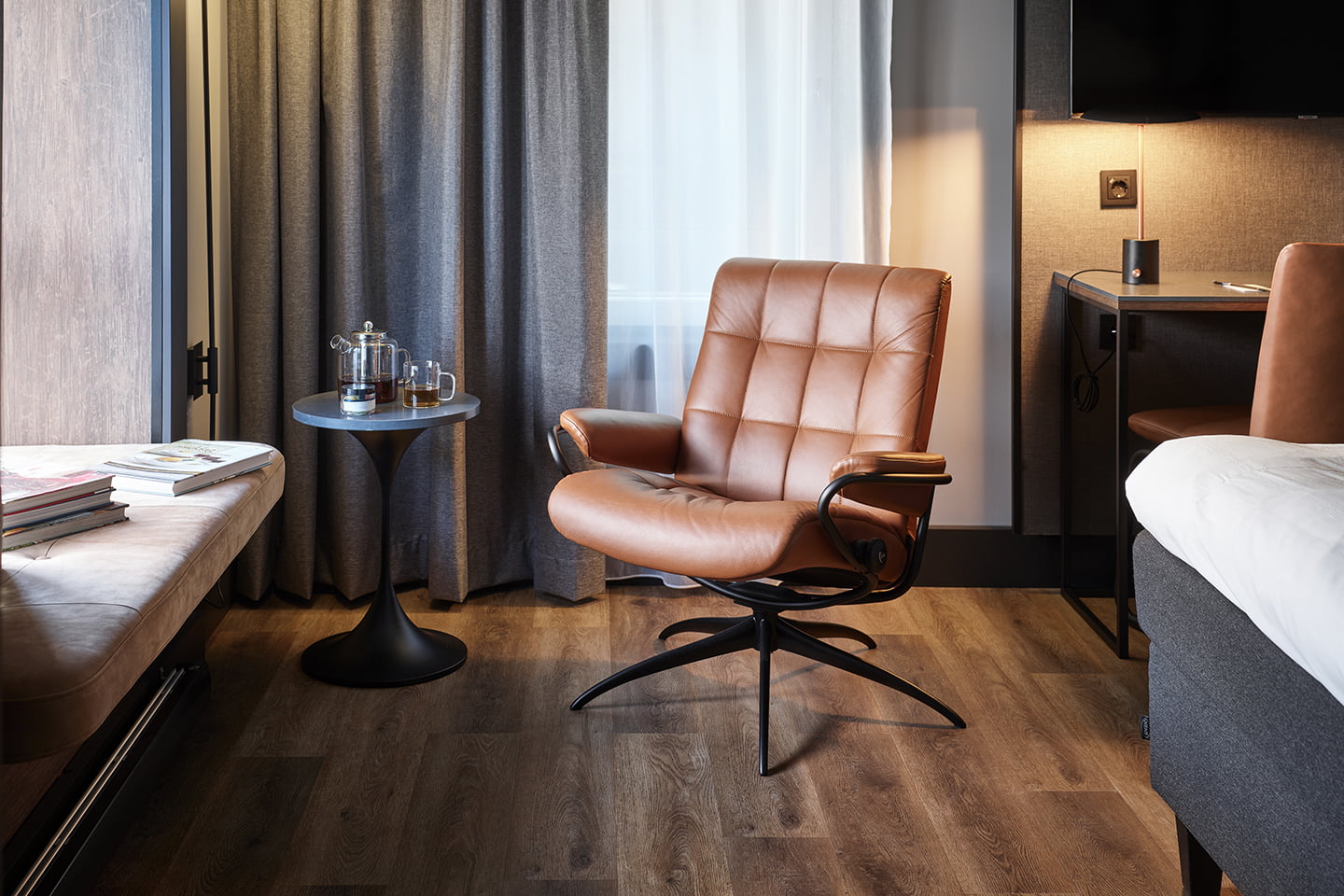 Stressless® London low back recliner in hotel room